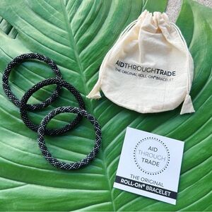 Set of 3 Black and Dark Blue Aid Through Trade Roll On Bracelets